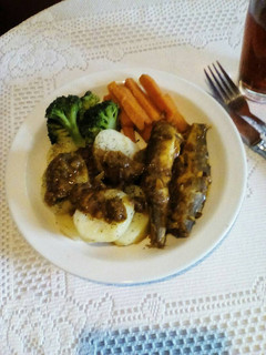 A picture of Curry Baby Hake in Tomato Pepper Sauce.