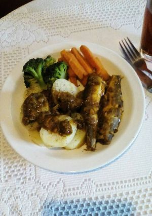 A picture of Curry Baby Hake in Tomato Pepper Sauce.