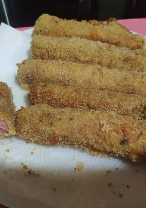 Una foto de Salchichas rellenas de queso y revosadas
