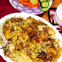 Hyderabadi chicken dum biryani A picture of Hyderabadi chicken dum biryani.