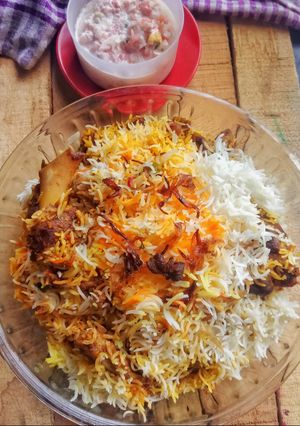 A picture of Kacche Gosht ki Biryani (Raw Meat Biryani).
