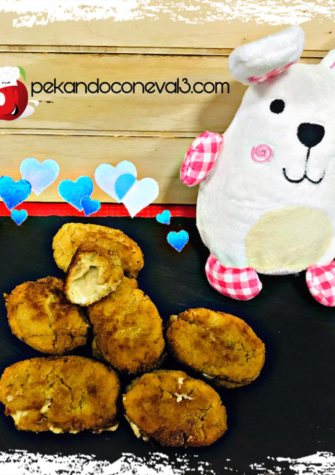 Una foto de Croquetas de queso azul y cebolla caramelizada
