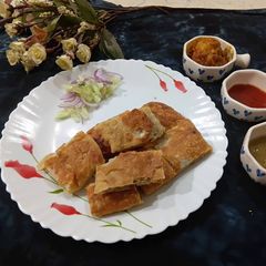 A picture of Egg Chicken Moglai Kolkata Street Style.