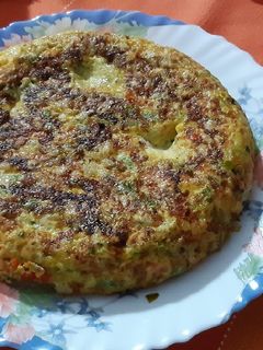 Una foto de Tortilla de champiñones y pimientos