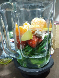 Una foto de Smoothie verde frutal