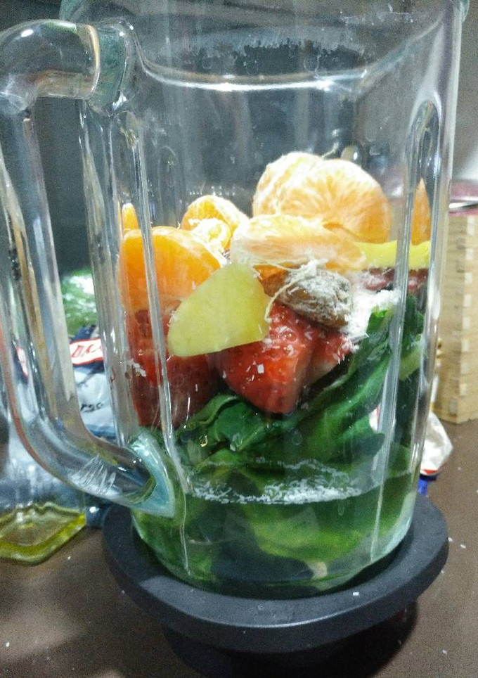 Una foto de Smoothie verde frutal