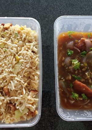 A picture of Chicken Fried Rice with Chicken Manchurian.