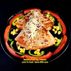 Paneer Vegetable Pizza Tortilla Wrap A picture of Paneer Vegetable Pizza Tortilla Wrap.