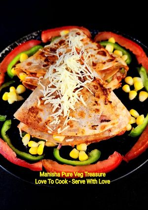 A picture of Paneer Vegetable Pizza Tortilla Wrap.