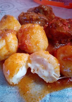 Una foto de Ñoquis rellenos de queso