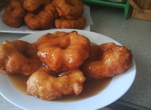 Una foto de Picarones bañados en un delicioso almíbar casero de Norma