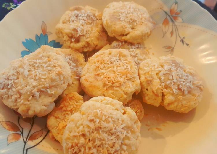 Shortbread cookies filled with orange zest and coconut. π
