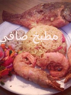 صورة لوصفة جمبري وسمك بلطي مع ارز بالفلفل الاحمر الحار