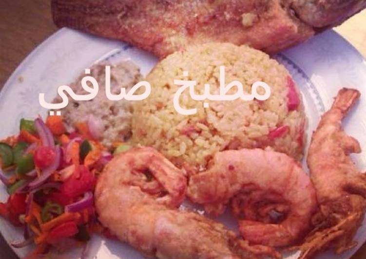 جمبري وسمك بلطي مع ارز بالفلفل الاحمر الحار