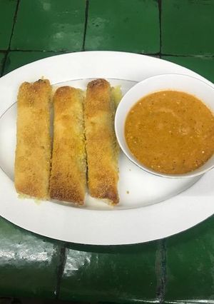 A picture of Baked Cheese Flautas.