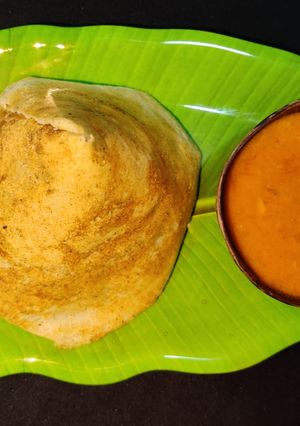 A picture of Tomato sambhar.