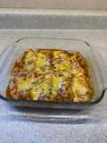Chicken fillets bakedIn enchilada sauce