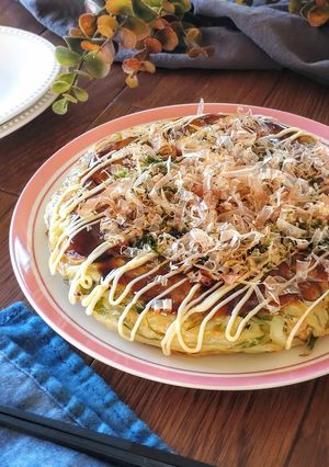 A picture of Cabbage-Free Okonomiyaki with Onion and Chikuwa (No Eggs).
