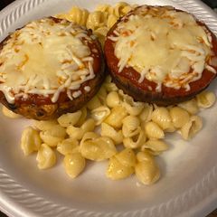 Veggie parmesan over mac & cheese A picture of Veggie parmesan over mac & cheese.