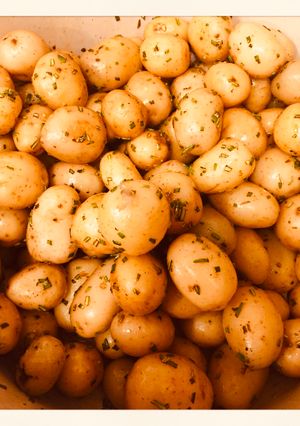 Una foto de Papas al romero