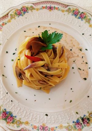 Foto di Fettuccine con funghi champignon crema e porcini dell' Etna