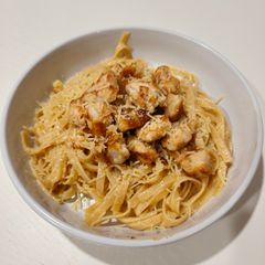A picture of Creamy Fettuccine with Chicken Bites.