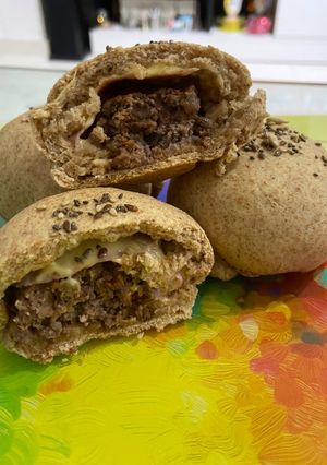 Una foto de Mini hamburguesas en pan de pizza integral
