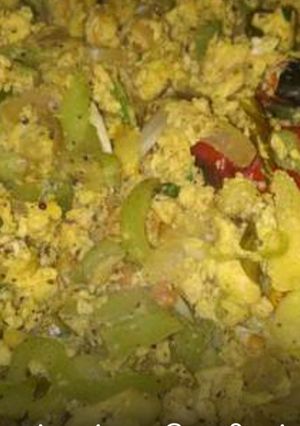 A picture of Ridge gourd with egg.