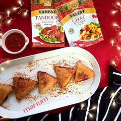 Triangle chicken puff samosa A picture of Triangle chicken puff samosa.