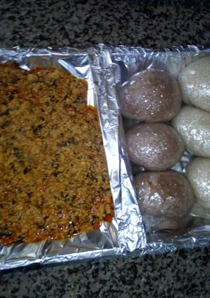 A picture of Egusi Soup with Wheat /Semovita Swallow.