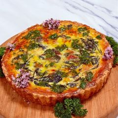 A picture of Spinach tart with yoghurt and cheddar crust.