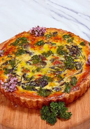 A picture of Spinach tart with yoghurt and cheddar crust.