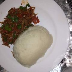 A picture of Fried Omena with Ugali.