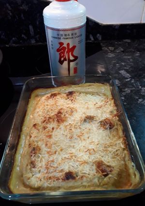 Foto principal de Alitas de pollo al licor de arroz y gratén de crema de lechuga