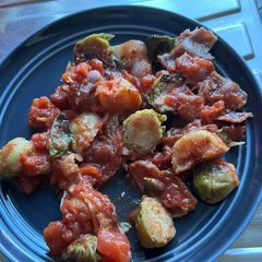A picture of Bacon, Tomatoes, and Sprouts Dish.