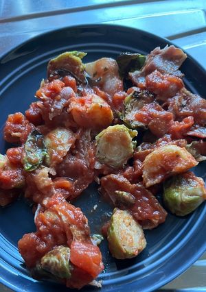 A picture of Bacon, Tomatoes, and Sprouts Dish.