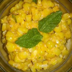 A picture of Cheesy corn salad.