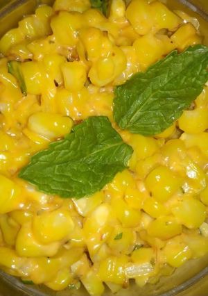 A picture of Cheesy corn salad.