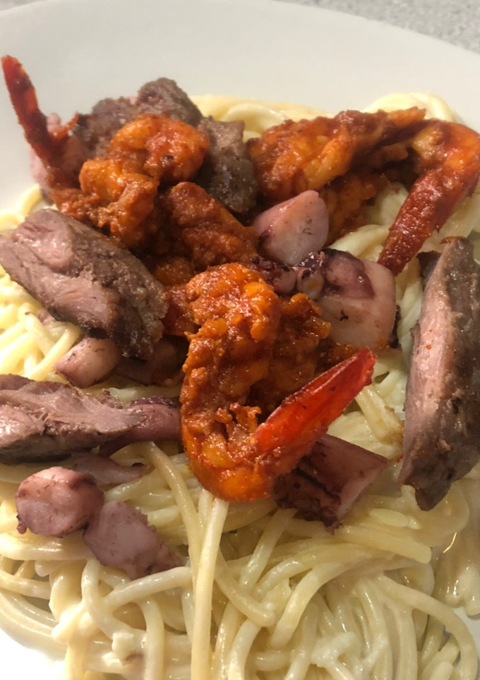 Una foto de Spaghetti de Mar y tierra