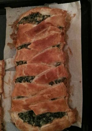 Una foto de Trenza de espinacas y gambas