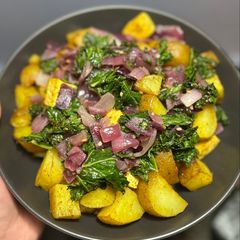 A picture of Greek Tofu and Potato Bowl with Lemon Cilantro Aioli.