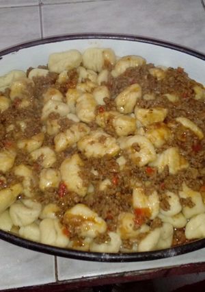 Una foto de Ñoquis a la Bolognesa