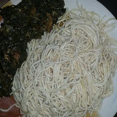 A picture of Spaghetti with vegetable sauce.