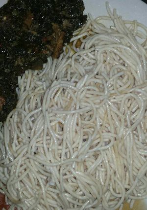 A picture of Spaghetti with vegetable sauce.