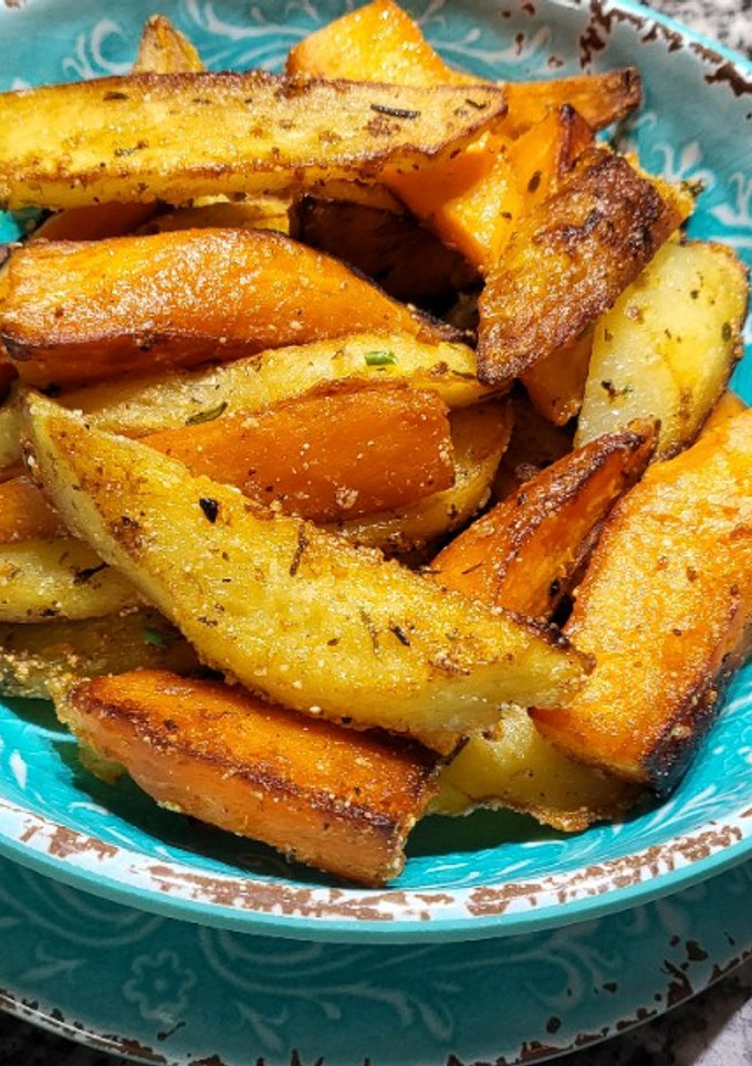 Una foto de Papas y boniatos en el wok