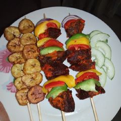 A picture of Beef kebab with plantain.
