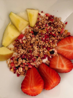Una foto de Yogur con toppings