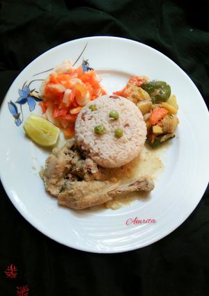 A picture of Peas Pulao with Milk based Chicken Rezala.