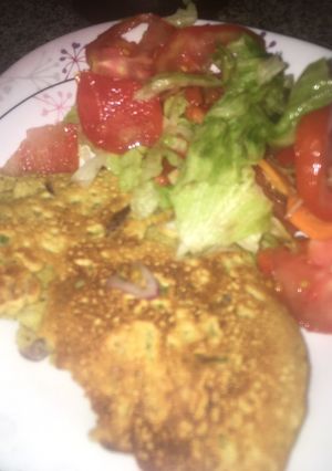 A picture of Gram flour pancake with salads.