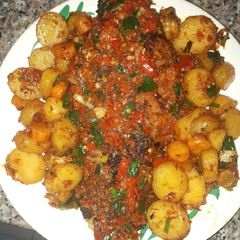 A picture of Fried fish with potatoes.